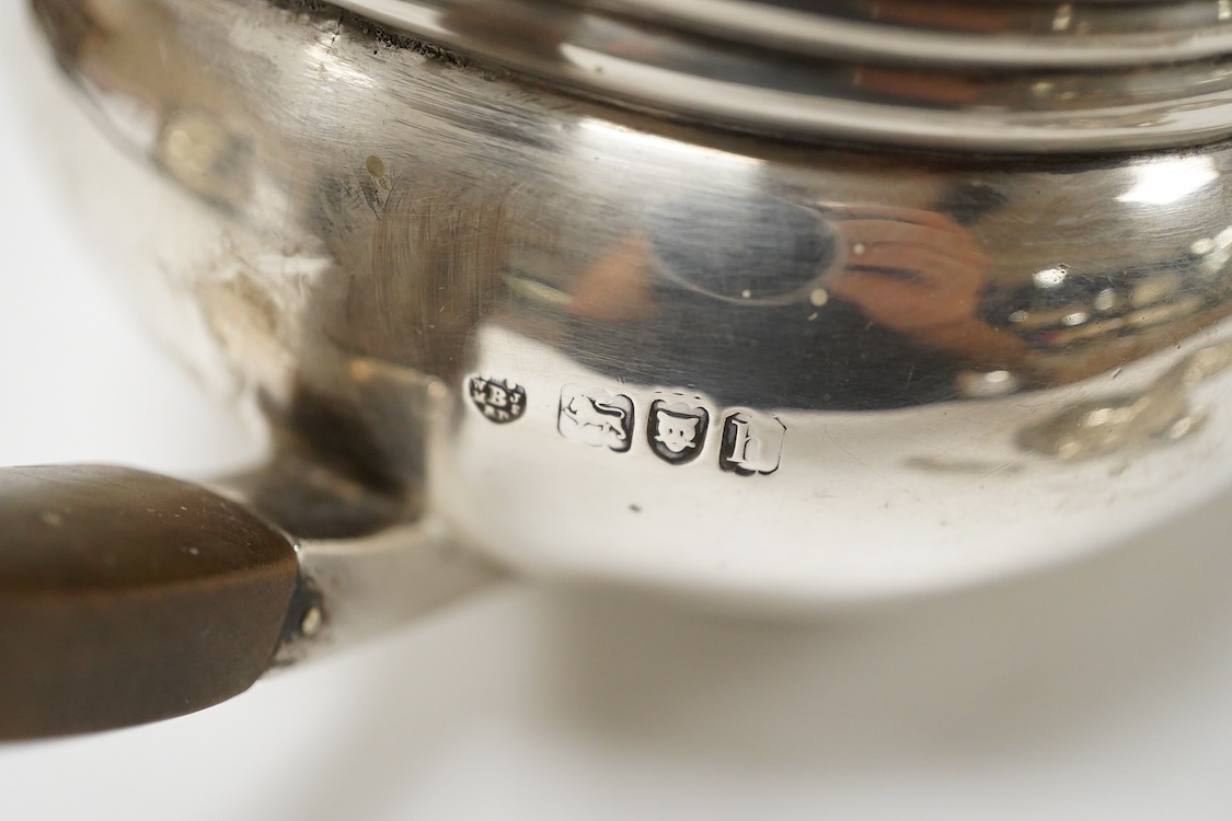 A late Victorian silver boat shaped sugar basket, by Thomas Bradbury & Sons, London, 1896, length 13.2cm, together with a pair of late Victorian repousse silver nut dishes and a silver condiment spoon. 4.8oz.